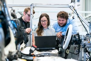 Industry 4.0: The Convergence of AI, IoT, and IT in Manufacturing